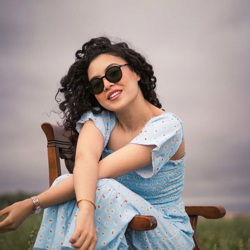 Portrait of a smiling, confident woman named Iryna.